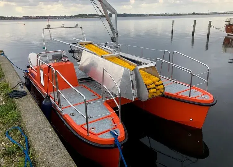 Shallow water oil recovery catamaran