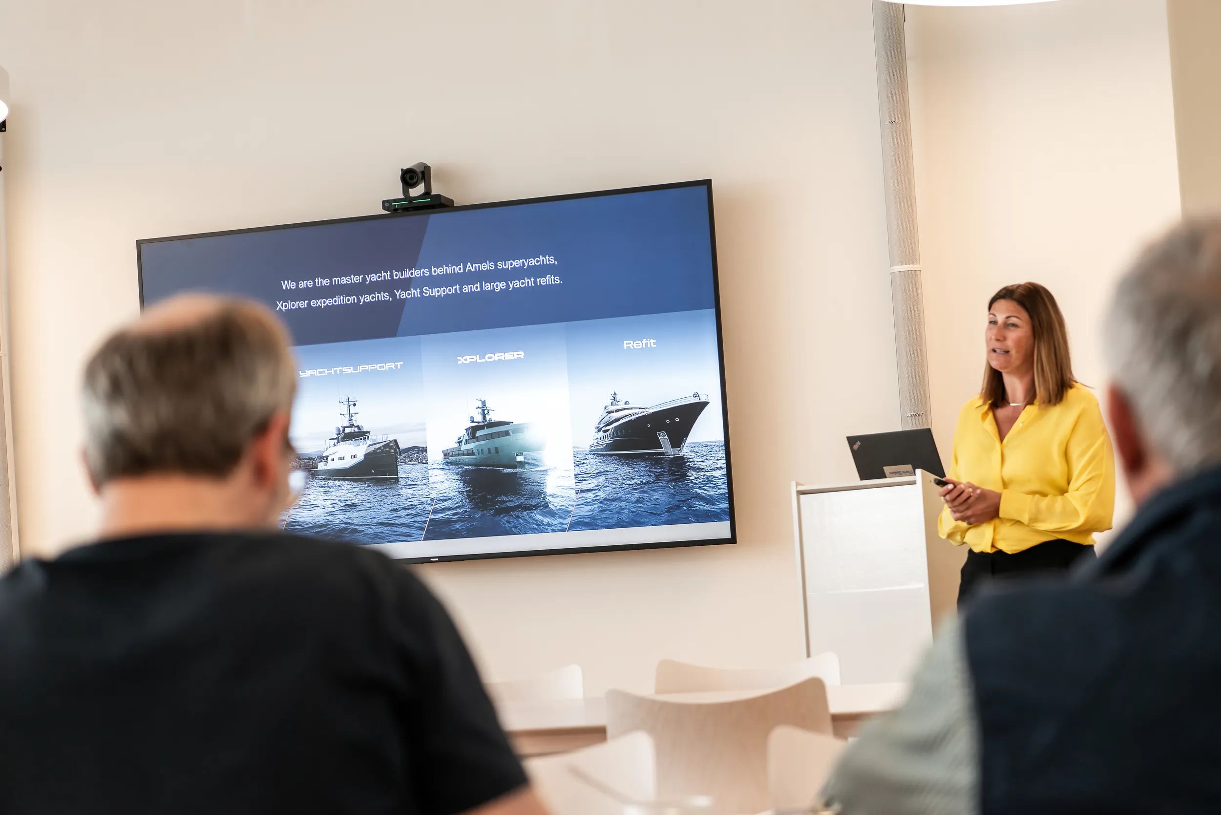 Sarah Flavell Marketing manager giving a presentation at Damen Yachting 